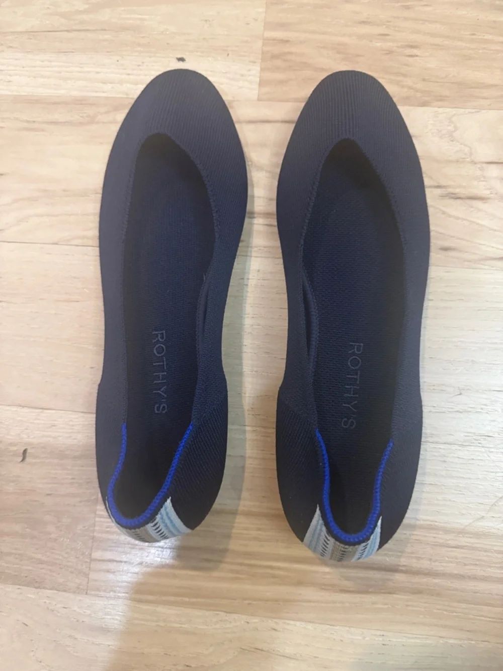 Rothy's Navy Knit Ballet Flats with Blue Trim and Gray Heel Tab - Picture 1 of 4